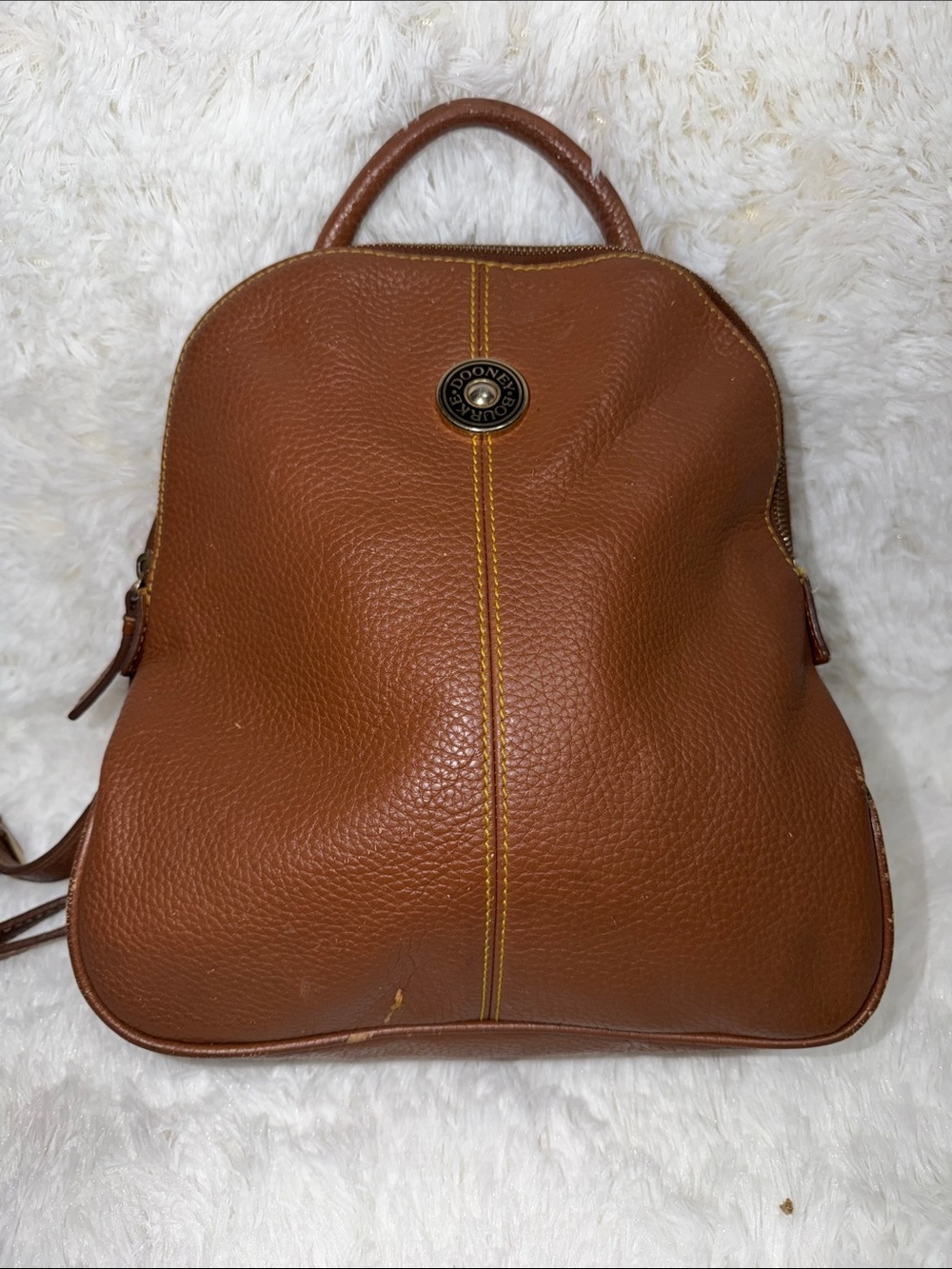 Dooney & Bourke Cognac Brown Pebbled Leather Backpack with Yellow Stitching